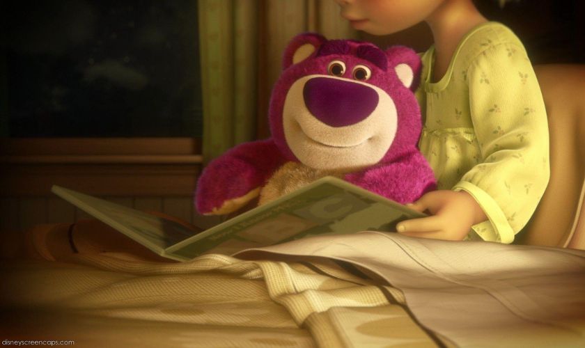 Hình nền gấu dâu đang đọc sách cho máy tính